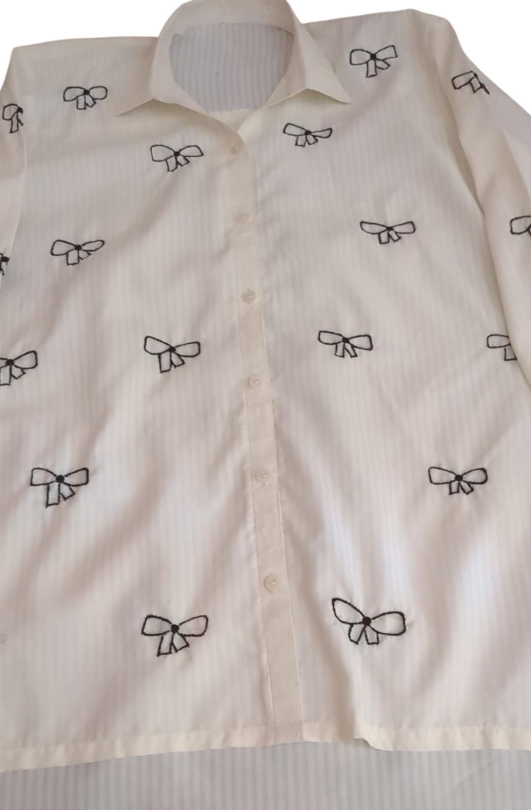 Elegant White Button-Up Shirt with Black Bow Embroidery
